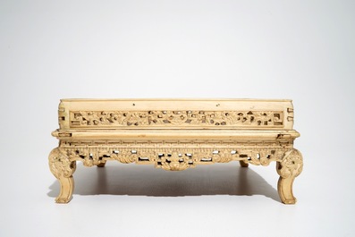 A large Chinese carved ivory stand, 18/19th C.