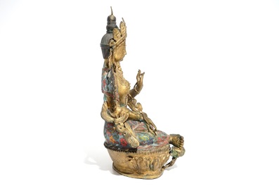 A large Chinese gilt bronze and cloisonn&eacute; figure of Green Tara, 19th C.