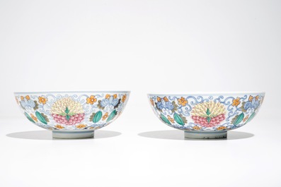A pair of Chinese doucai bowls with floral famille rose medallions, 4-character mark, 19/20th C.