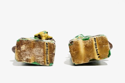 A pair of Chinese verte biscuit joss stick holders shaped as Buddhist lions, Kangxi