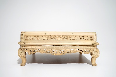 A large Chinese carved ivory stand, 18/19th C.
