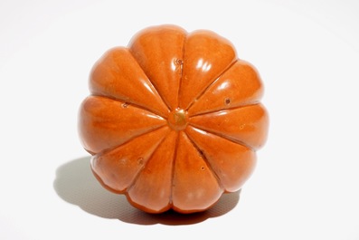 A Chinese coral-glazed model of a pumpkin, 19/20th C.