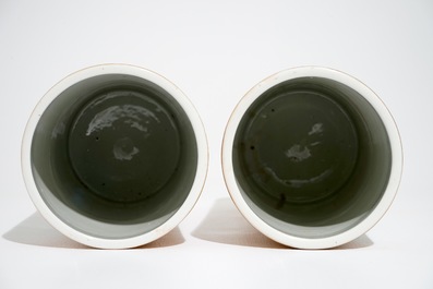 A pair of Chinese famille rose salmon pink-ground hat stands and a blue and white charger, 19/20th C.