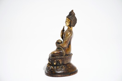 A Sino-Tibetan gilt bronze Buddha, Ming/Qing Dynasty, 16/17th C.
