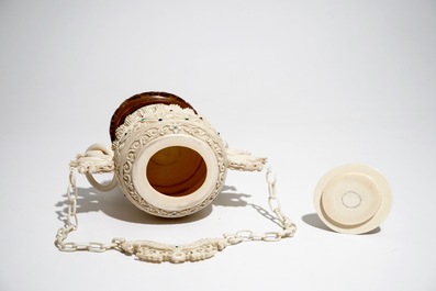 A Chinese encrusted ivory vase on wooden stand, early 20th C.