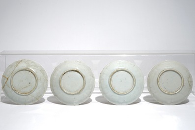 A pair of Chinese famille rose covered vases and four saucers, Yongzheng/Qianlong