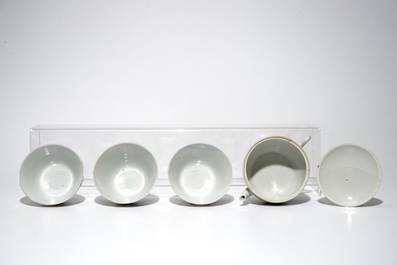 A Chinese qianjiang cai teapot and three famille rose cups, 19th C