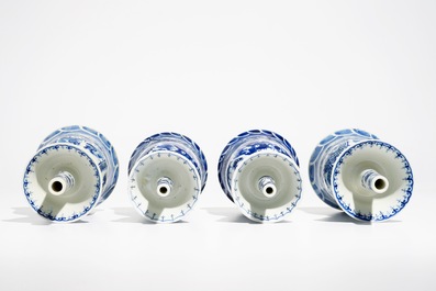 Two pairs of Chinese blue and white candlesticks with dragons, 19/20th C.