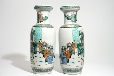 A pair of tall Chinese famille verte vases with court scenes, 19th C.
