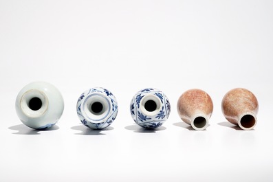 Five Chinese blue and white and copper red miniature vases, Kangxi
