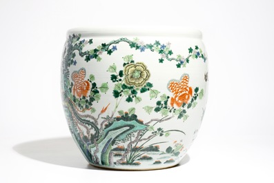 A Chinese famille verte fish bowl with a phoenix and mandarin ducks, 19th C.