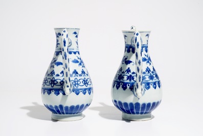 A pair of Chinese blue and white ewers, Transitional period