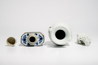 A Chinese Dehua blanc de Chine temple lion, a vase and a blue and white tea caddy, Kangxi and later