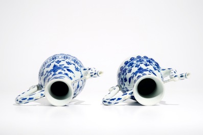 A pair of Chinese blue and white ewers, Transitional period