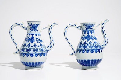 A pair of Chinese blue and white ewers, Transitional period
