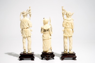Three Chinese ivory figures on wooden bases, 1st half 20th C.
