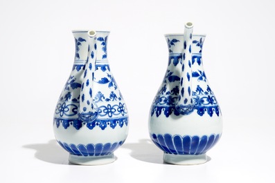 A pair of Chinese blue and white ewers, Transitional period