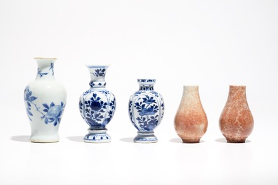 Five Chinese blue and white and copper red miniature vases, Kangxi
