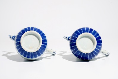 A pair of Chinese blue and white ewers, Transitional period