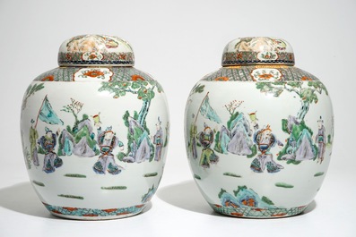 A pair of Chinese famille verte covered jars with figural design, 19th C.