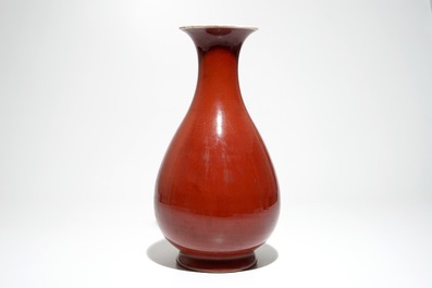 A Chinese monochrome red yuhuchunping vase, 19th C.