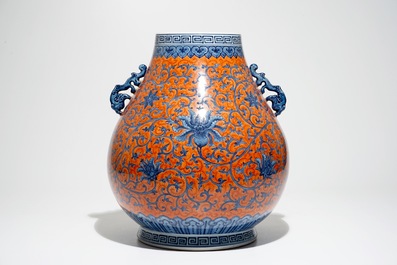 A Chinese coral-ground peony scroll hu vase, Yongzheng mark, 20th C.