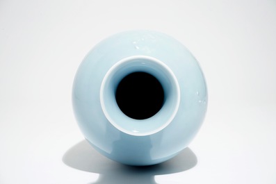 A Chinese monochrome lavender-blue vase with underglaze design, Yongzheng mark, 19th C.