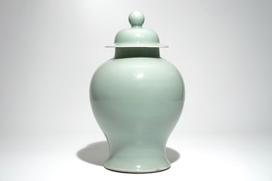 A Chinese monochrome celadon baluster vase and cover, 19th C.