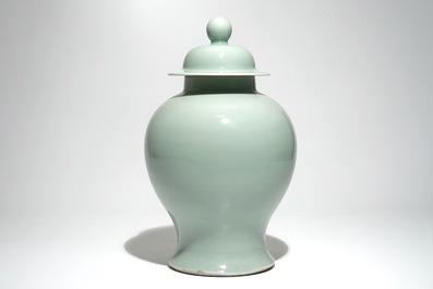 A Chinese monochrome celadon baluster vase and cover, 19th C.