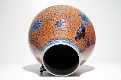 A Chinese coral-ground peony scroll hu vase, Yongzheng mark, 20th C.