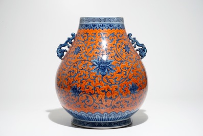 A Chinese coral-ground peony scroll hu vase, Yongzheng mark, 20th C.
