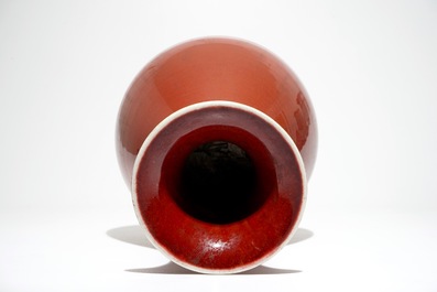A Chinese monochrome red yuhuchunping vase, 19th C.