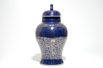 A Chinese vase and cover with gilt design on powder blue-ground, Kangxi mark, prob. 19/20th C.