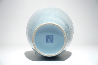 A Chinese monochrome lavender-blue vase with underglaze design, Yongzheng mark, 19th C.