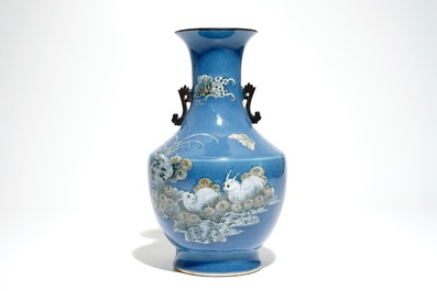 A Chinese blue ground-vase with rabbits and butterflies, 19th C.