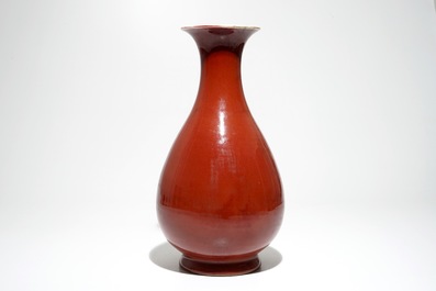 A Chinese monochrome red yuhuchunping vase, 19th C.