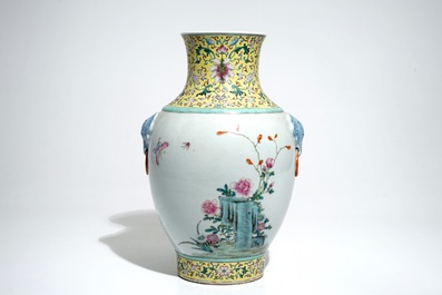 A Chinese famille rose hu vase with birds among flowers on rockwork, Qianlong mark, 19/20th C.