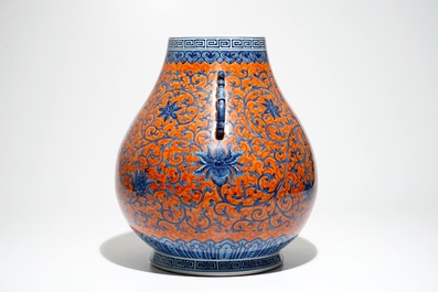 A Chinese coral-ground peony scroll hu vase, Yongzheng mark, 20th C.