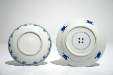 Twenty-two Chinese blue and white saucers, mostly Kangxi