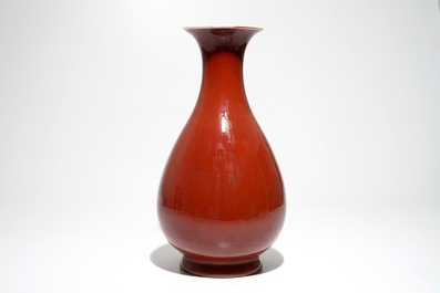 A Chinese monochrome red yuhuchunping vase, 19th C.