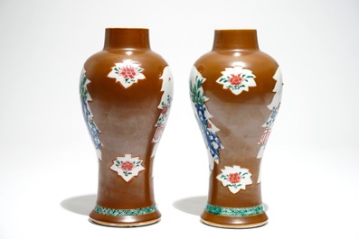 A pair of Chinese Batavian ware famille rose vases, Yongzheng/Qianlong