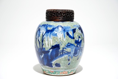 A Chinese famille verte jar with wooden cover and stand, Kangxi