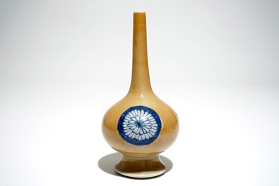 A Chinese blue and white on caf&eacute; au lait-ground sprinkler, Kangxi