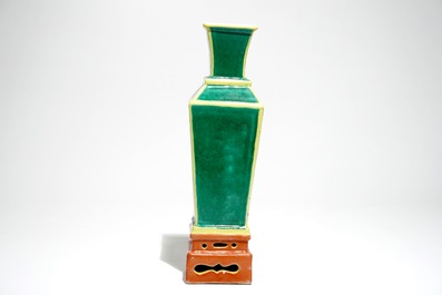 A tapered square Chinese vase on stand in green, yellow and orange, 19/20th C.