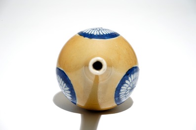 A Chinese blue and white on caf&eacute; au lait-ground sprinkler, Kangxi