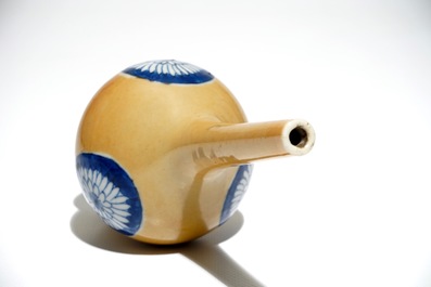 A Chinese blue and white on caf&eacute; au lait-ground sprinkler, Kangxi