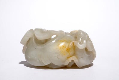 A Chinese white jade carving of a "Three rams" group, 19/20th C.