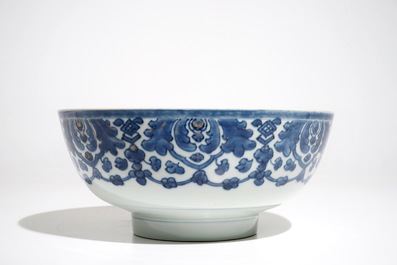 A Chinese blue and white bowl, Qianlong, and an iron red dish, 19th C.