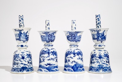 Two pairs of Chinese blue and white candlesticks with dragons, 19/20th C.
