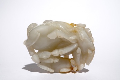 A Chinese white jade carving of a "Three rams" group, 19/20th C.